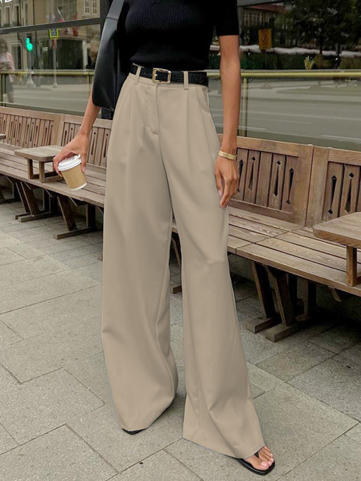 Women's wide-leg trousers detail shot of smooth structured fabric