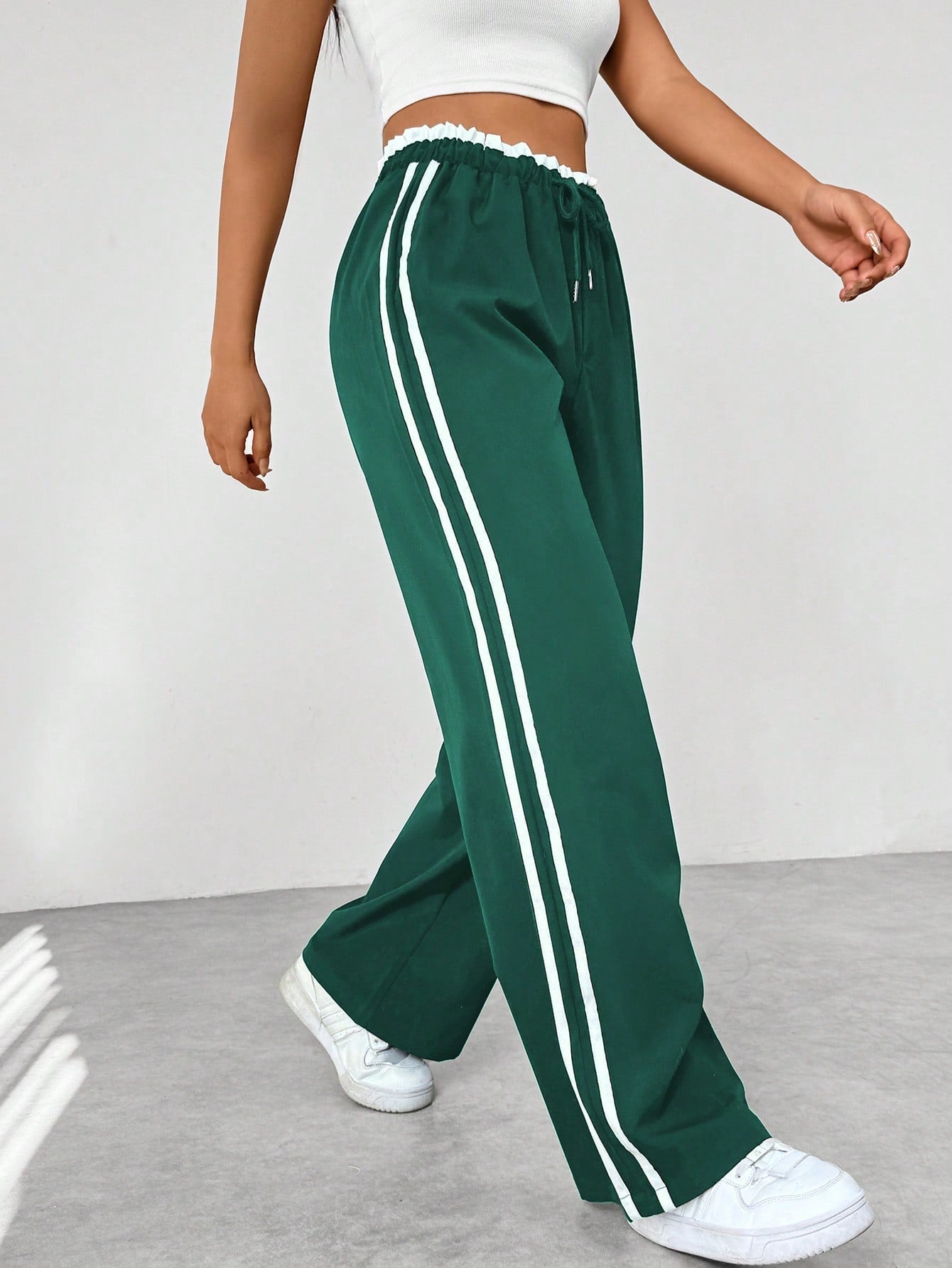 Women's breathable wide-leg sweatpants worn during everyday movement