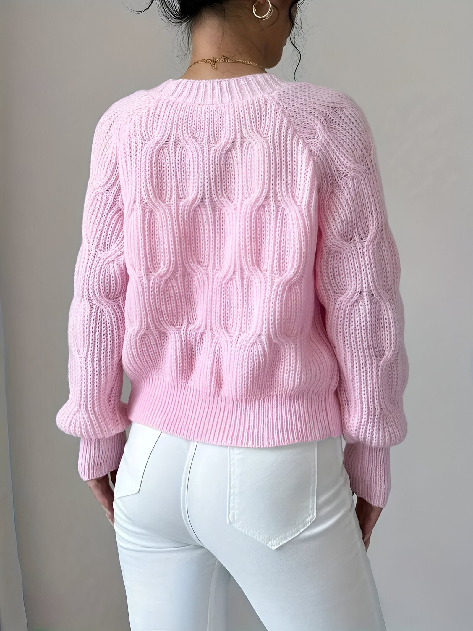 Women's knitted cardigan with V-neck and fitted silhouette, side view