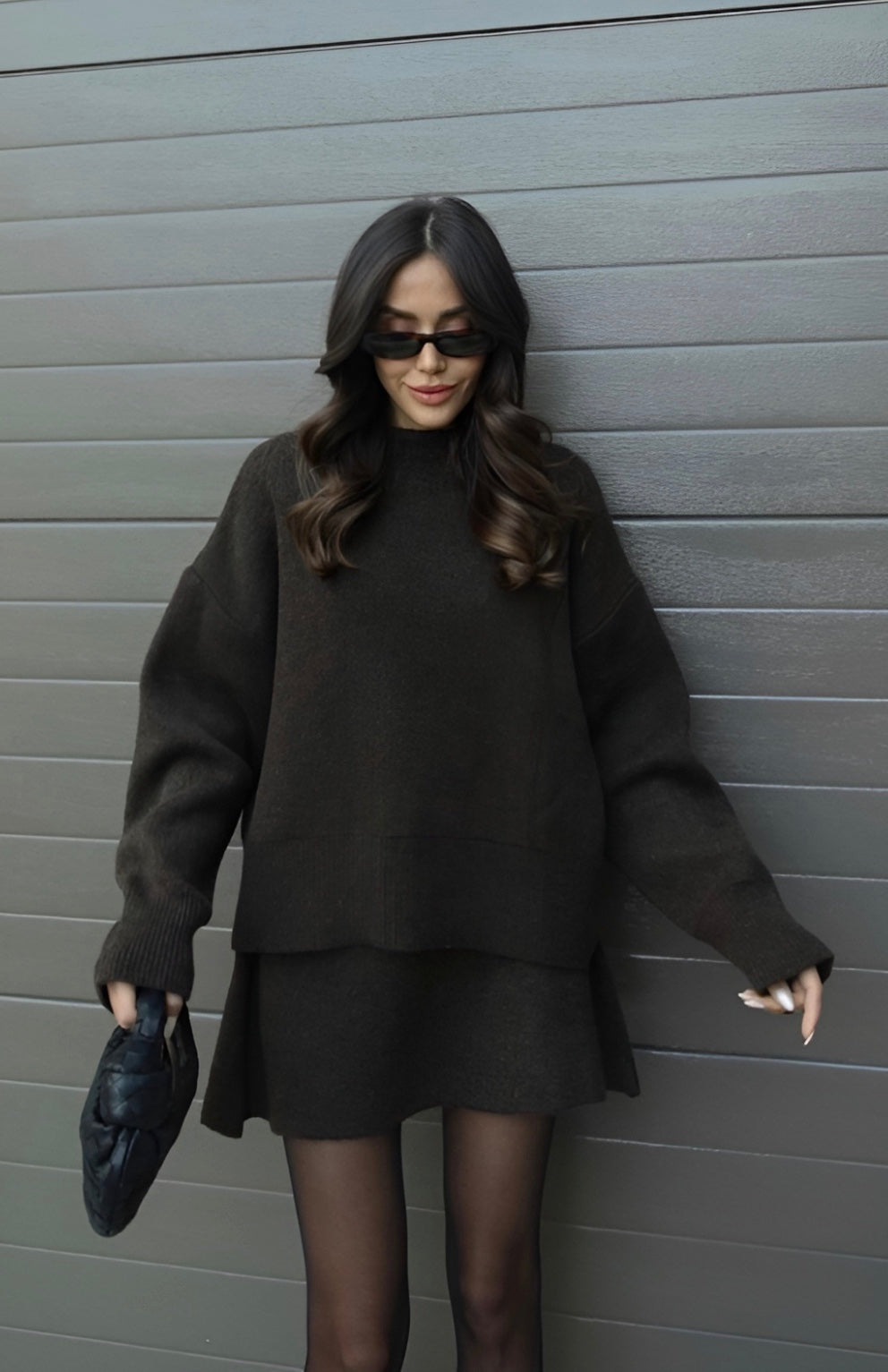 Women's knitted two-piece sweater and skirt set, relaxed everyday style, full outfit view