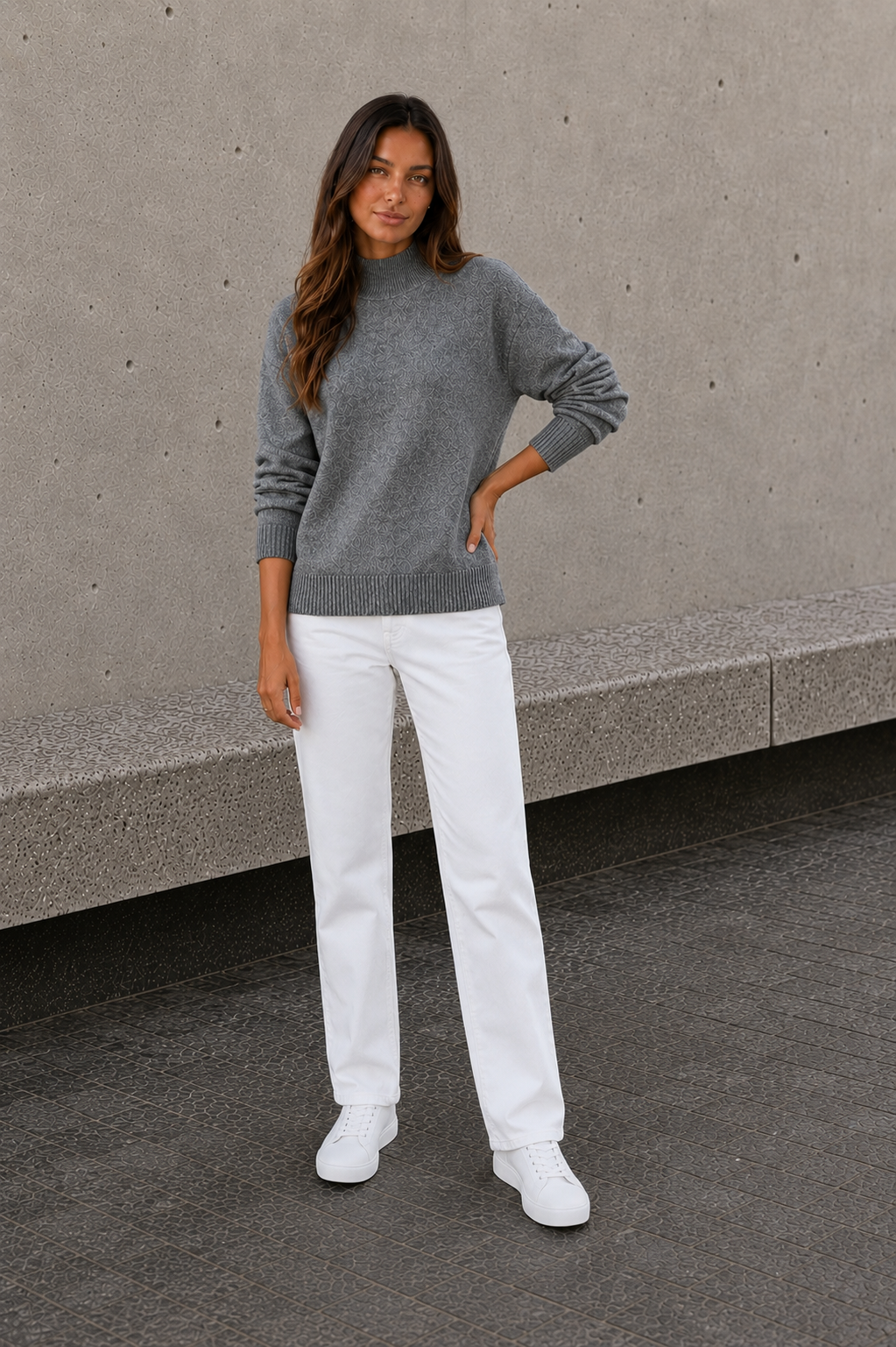Relaxed fit knitted sweater for women with high neckline and ribbed hem