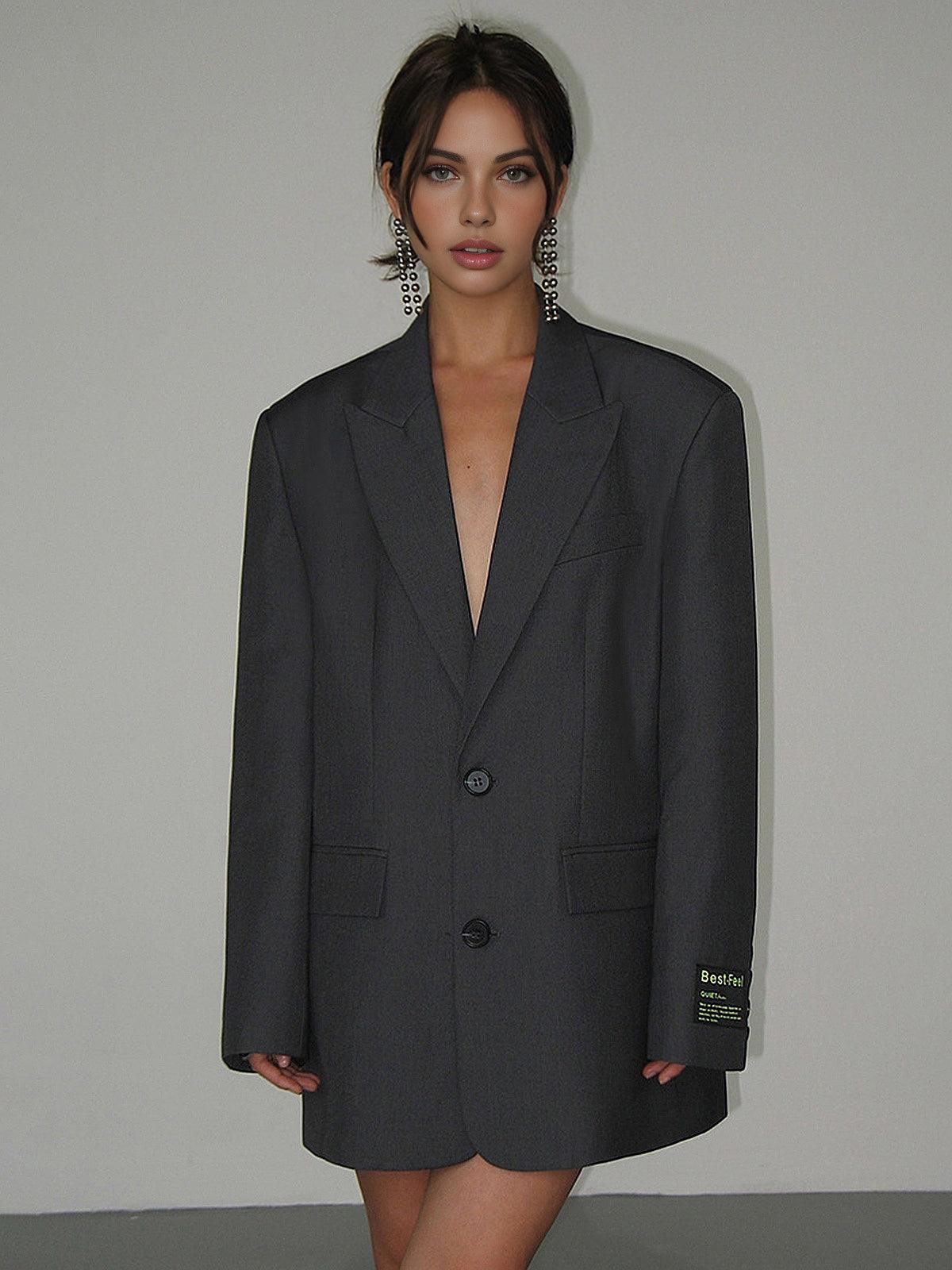 Lapel collar detail of women's oversized blazer coat in woven polyester blend fabric