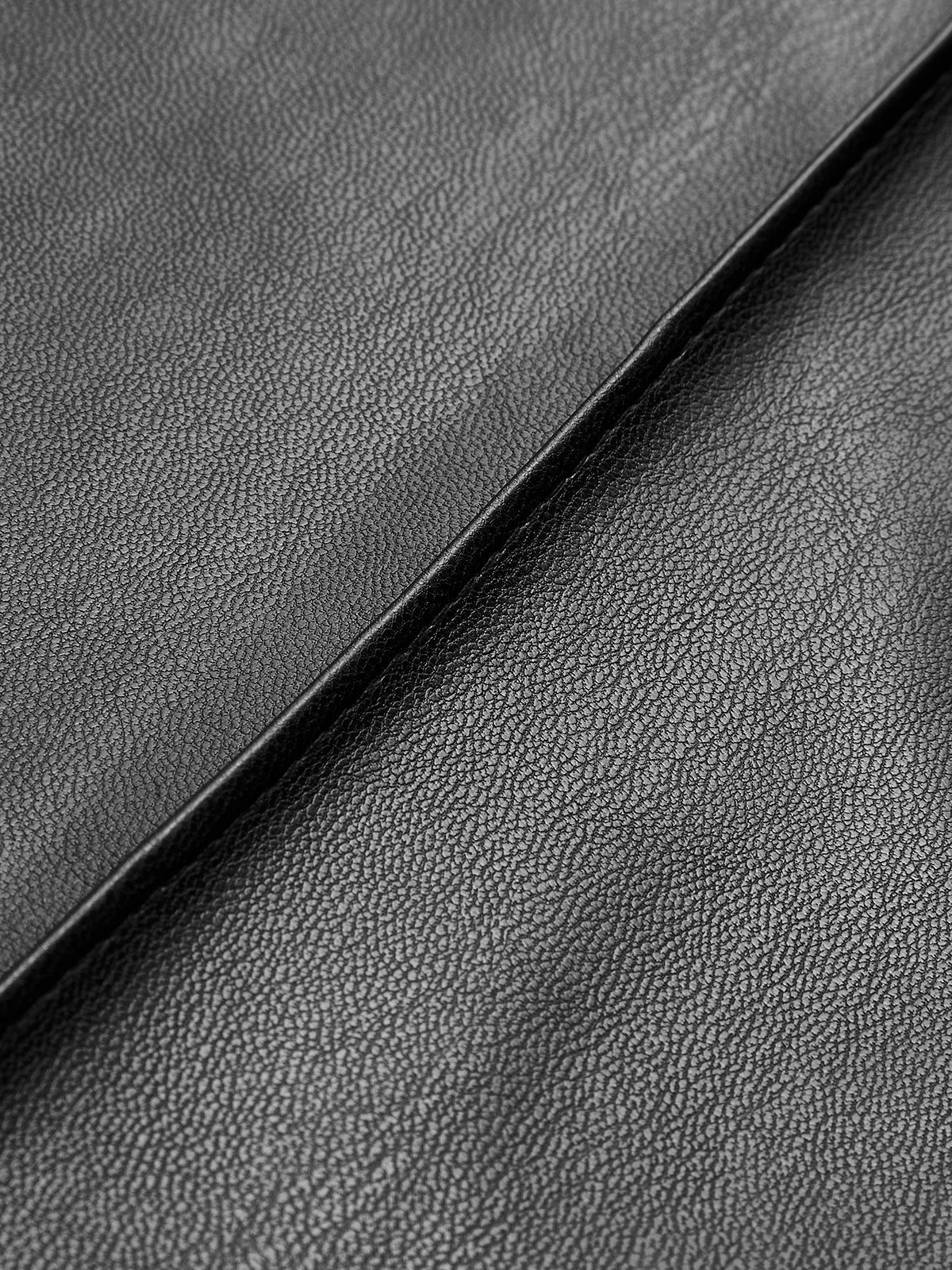 High-waisted faux leather trousers with defined front seam and structured fit
