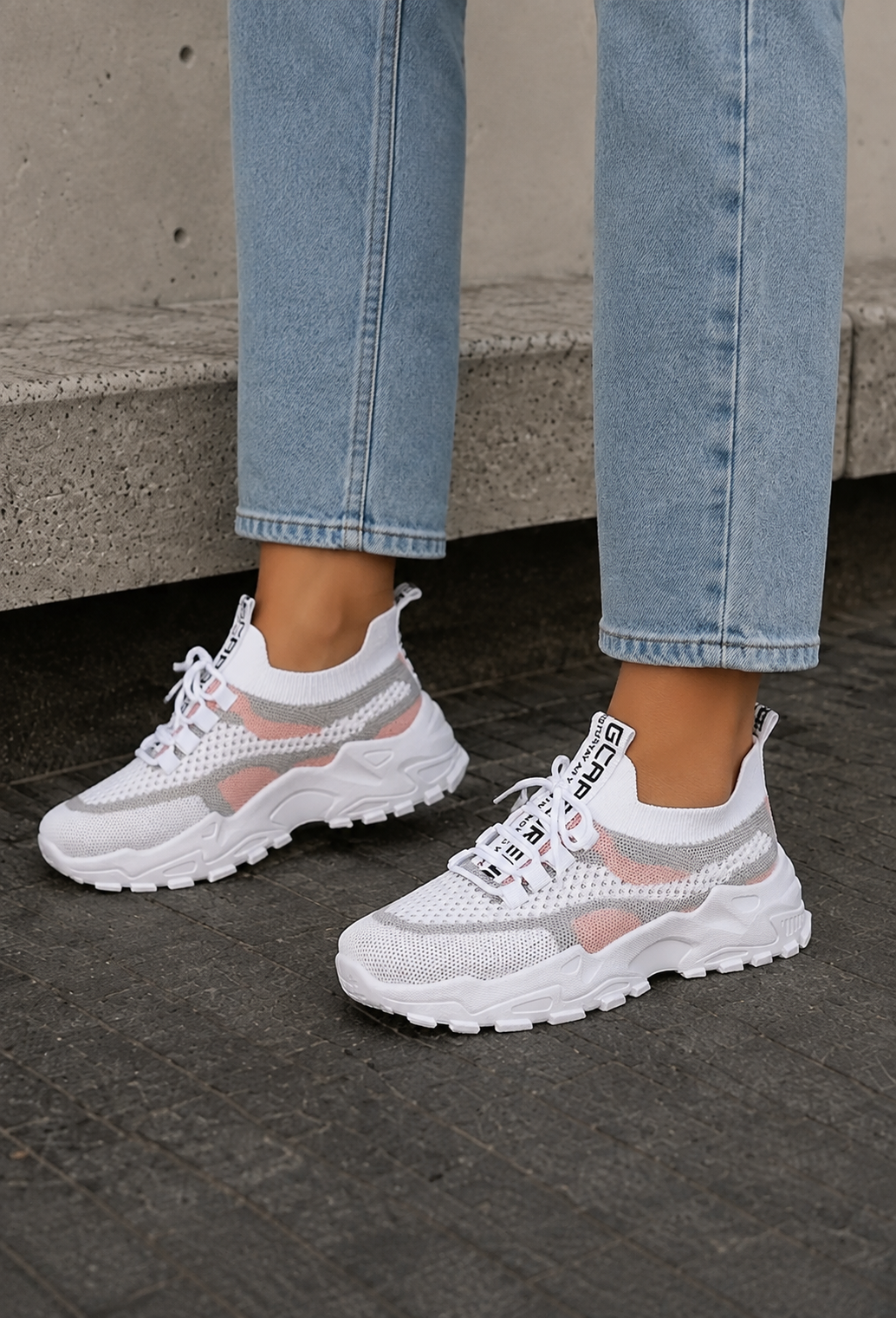 Women's breathable lightweight sneakers with mesh upper and lace-up closure, front view