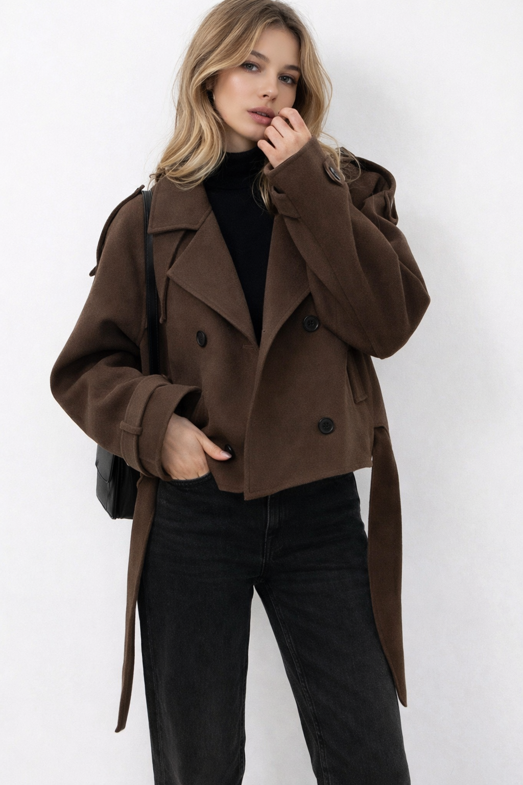 Women's short double-breasted coat with wide lapels and adjustable waist belt