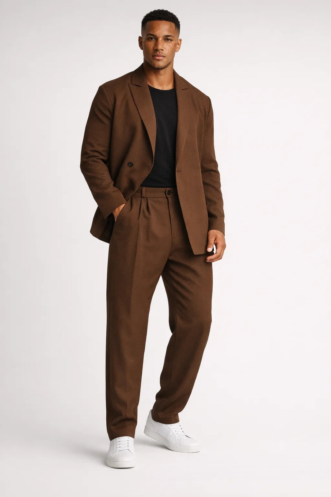Men's structured two-piece suit set with hip-length blazer and full-length relaxed trousers