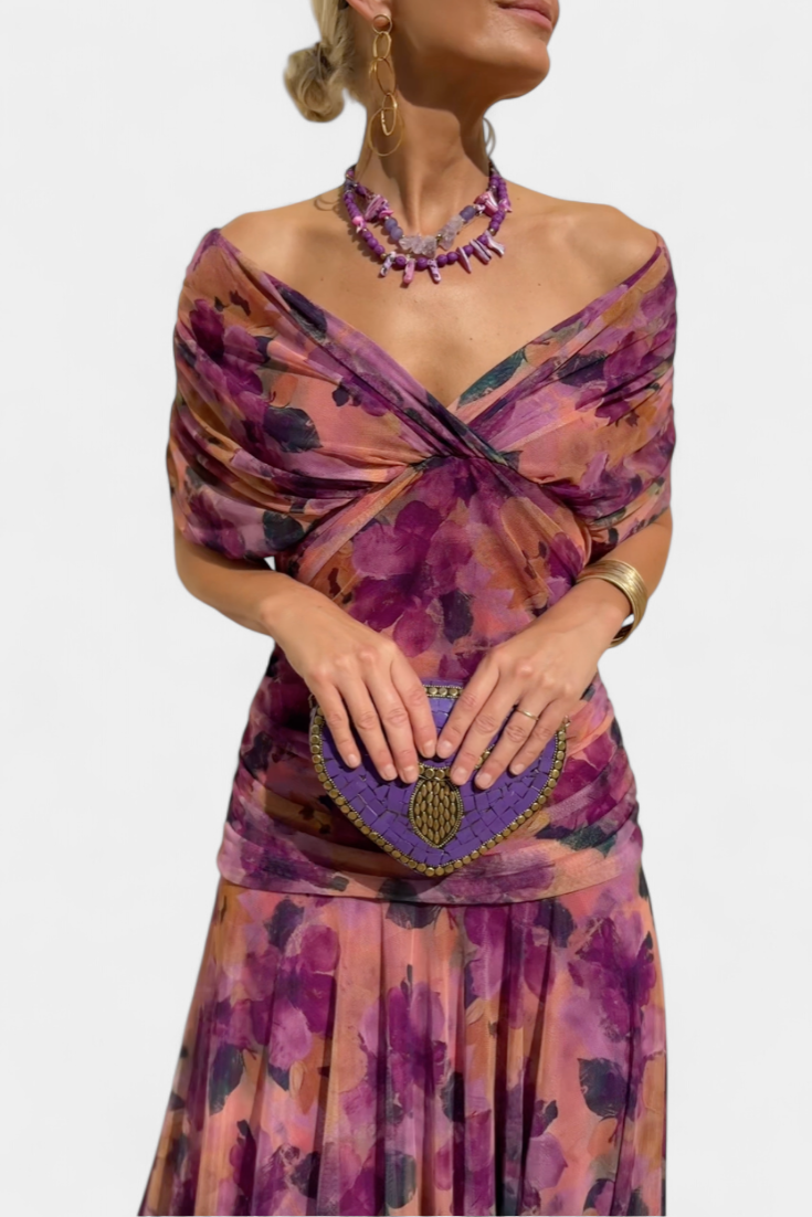 Off-shoulder maxi dress with draping and a soft, flowing maxi-length skirt for women