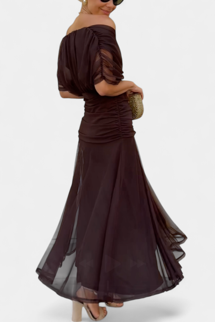 Off-shoulder maxi dress with gathered bodice draping and full-length silhouette