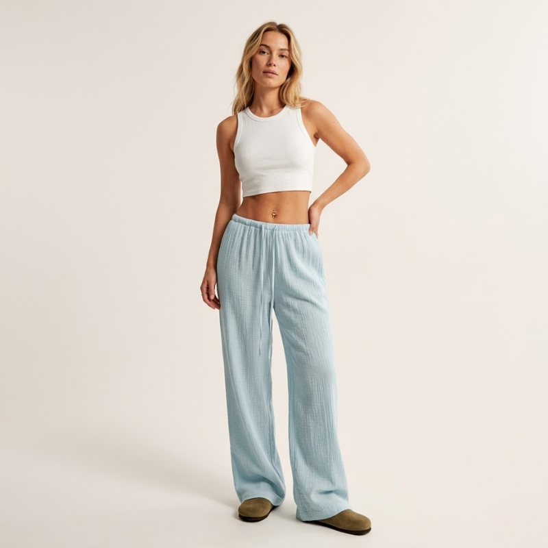 Women's wide-leg drawstring pants with elastic waist, side pockets, and minimalist design
