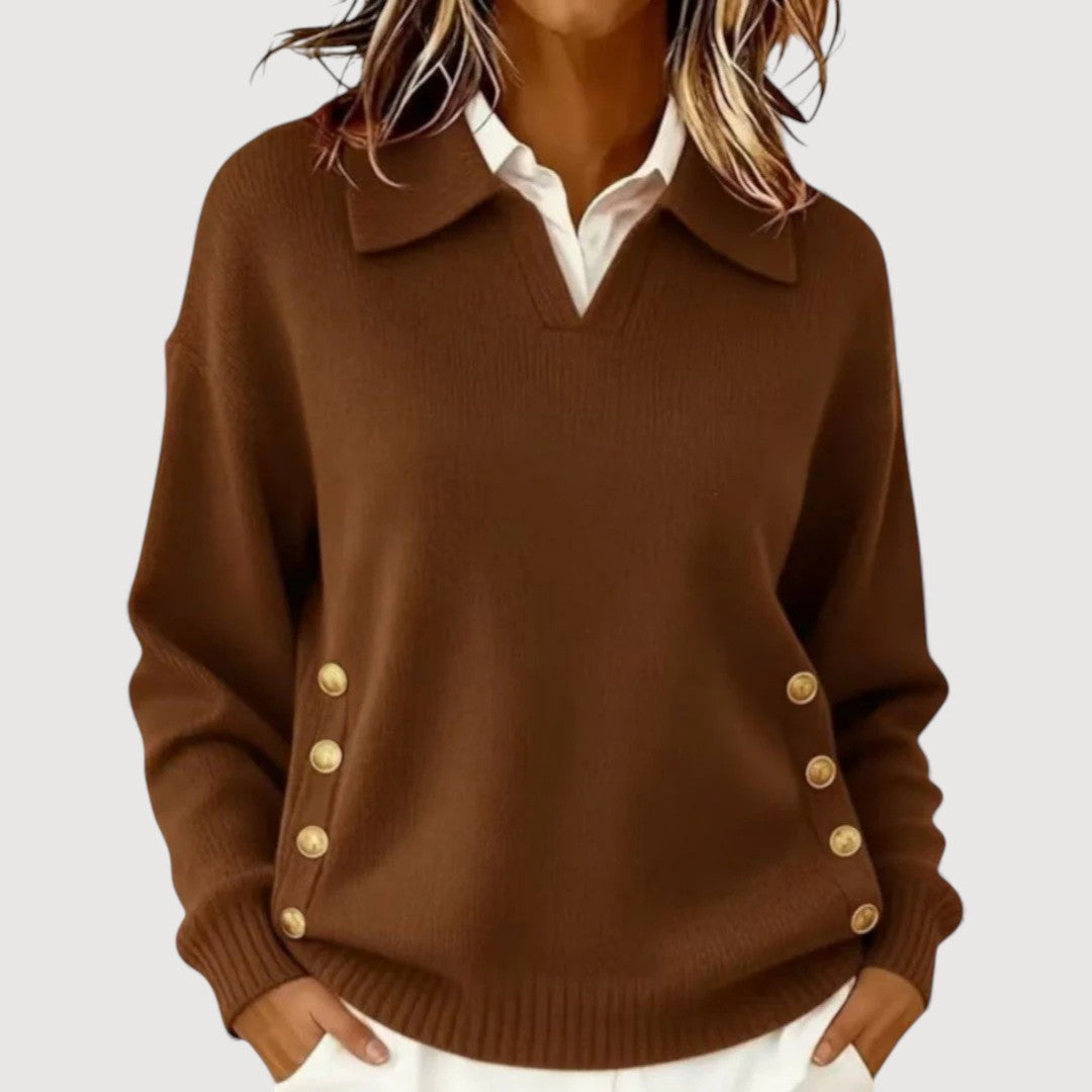 Stickad damtröja med knappar längs sidan och ledig passform