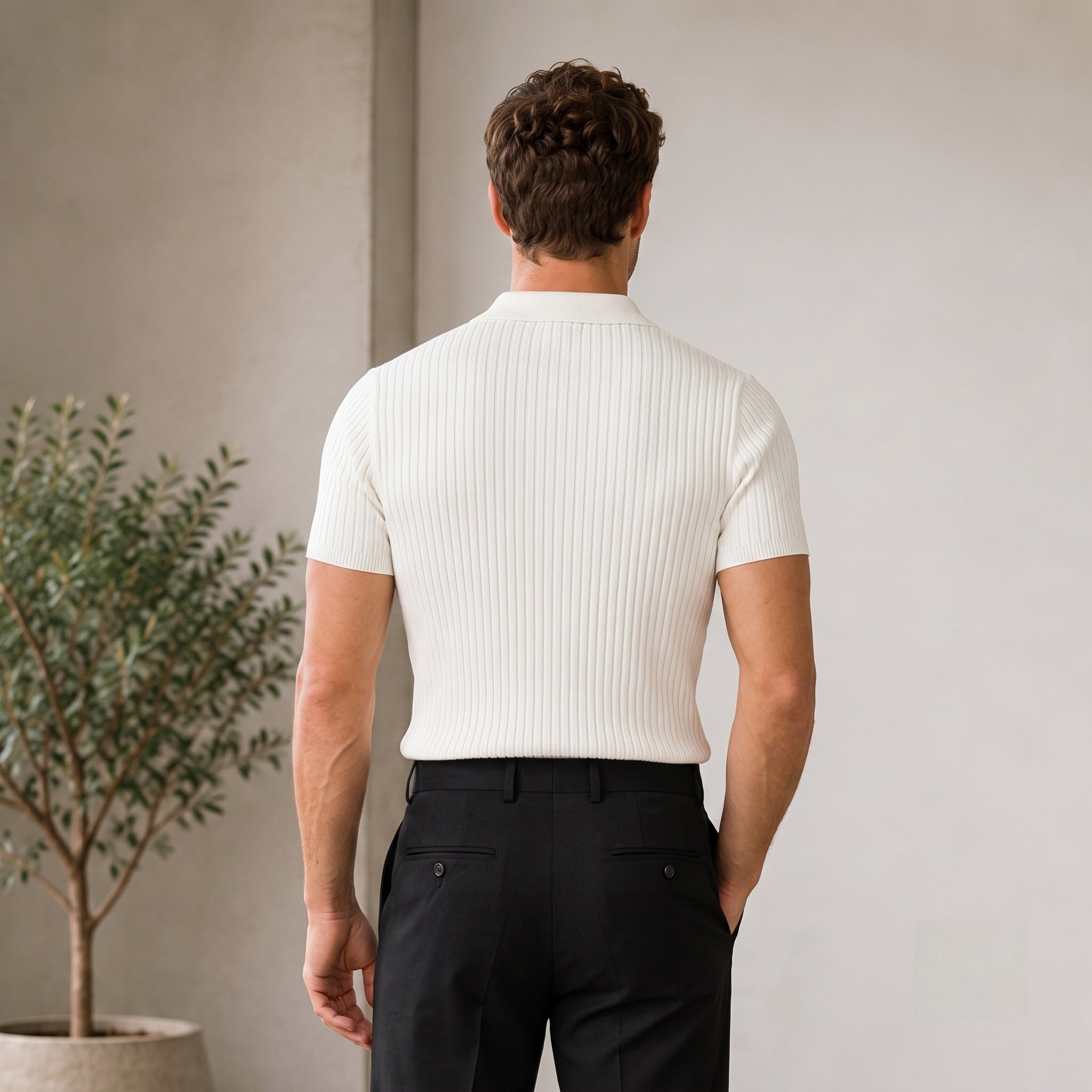 Men's slim-fit ribbed polo shirt featuring a short front zipper and straight hem