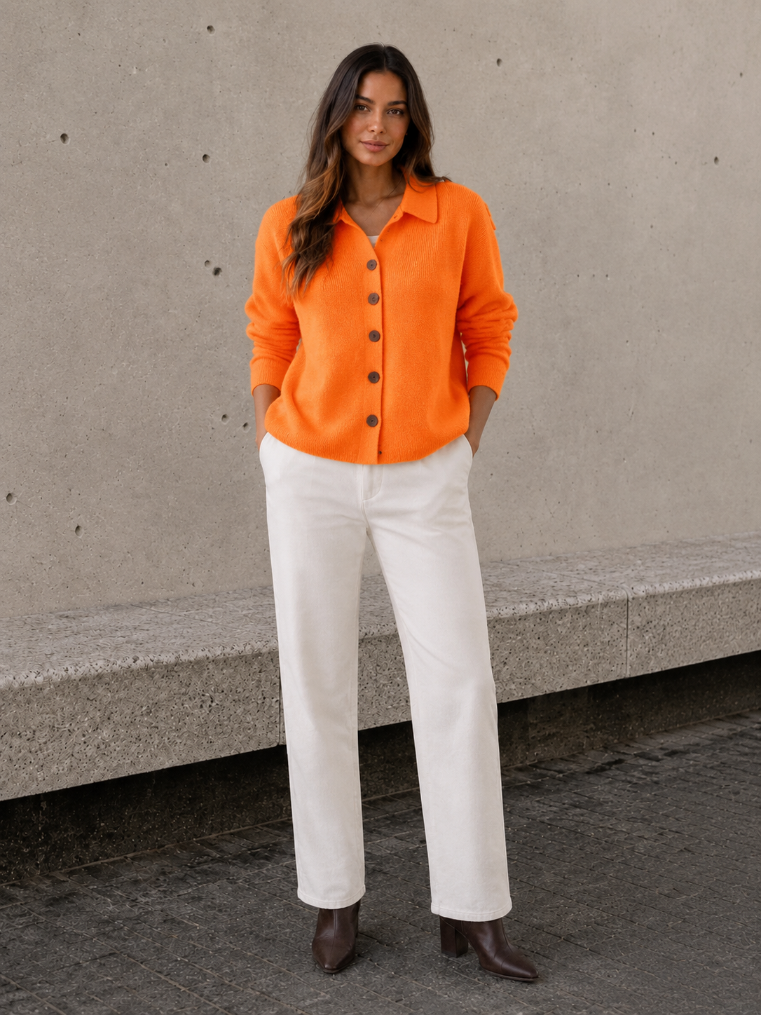 Women's orange button knit cardigan with collared neckline