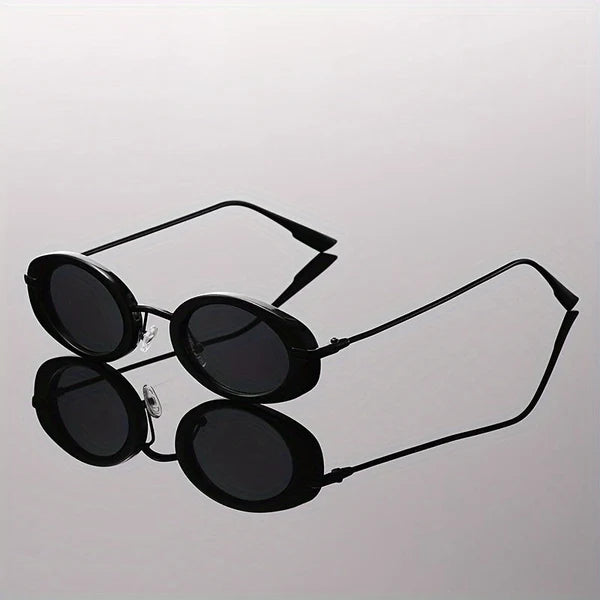 Women's black oval sunglasses with dark lenses