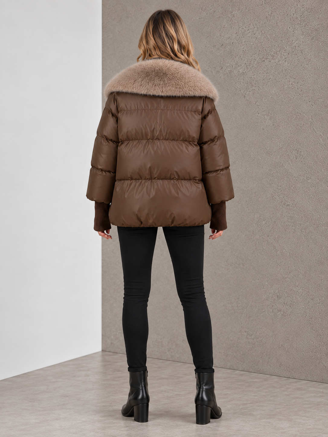 Women's light brown puffer winter coat with faux fur collar back view